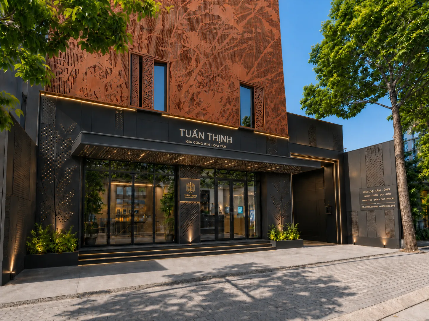 LASER Tuấn Thịnh storefront — laser-cut corten steel facade, Thủ Dầu Một